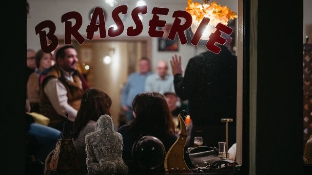 Rencontre à la Brasserie La Lorraine Image de Rencontre à la Brasserie La Lorraine